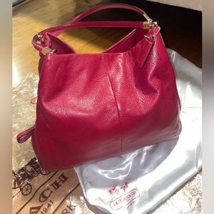 Red arm bag, completely new, comes with its dust cover